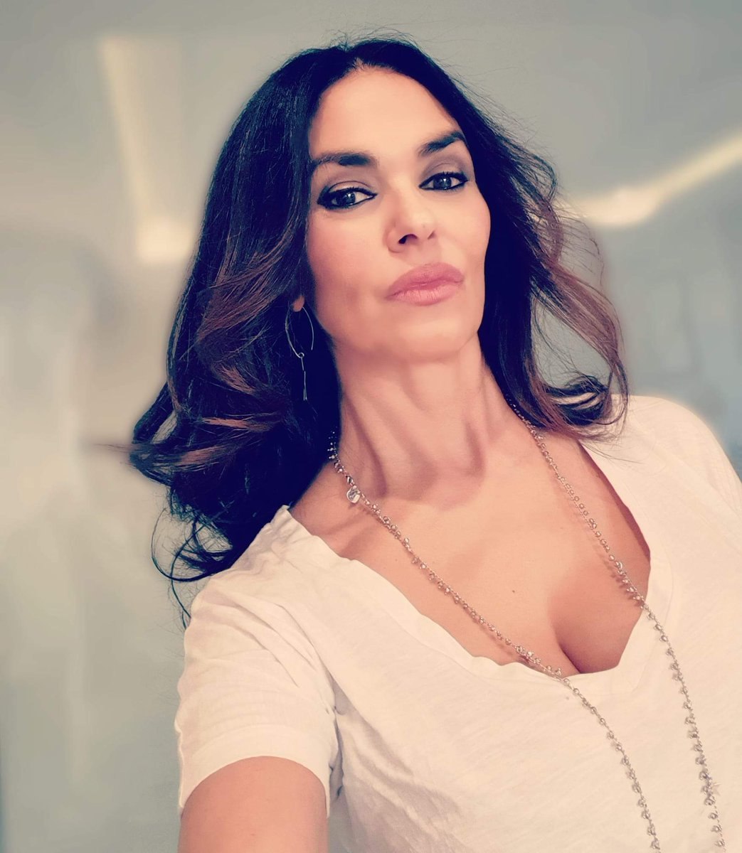 Мария Грация Кучинотта грудь