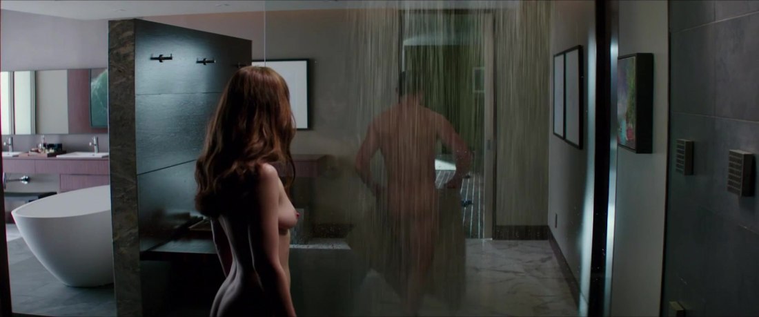 Голая Дакота Джонсон в фильме 50 оттенков серого