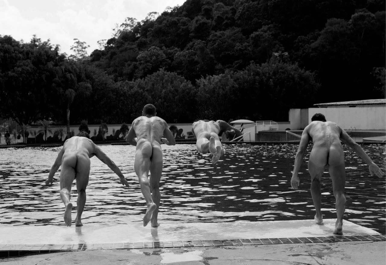 Naked boys swimming