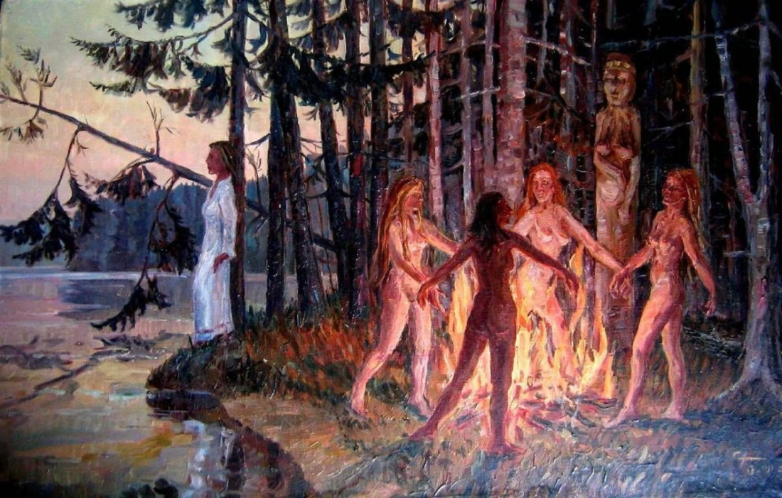 Голая женщина возле костра