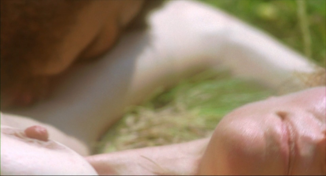 Tilda Swinton nude and sweaty lying on the Bed