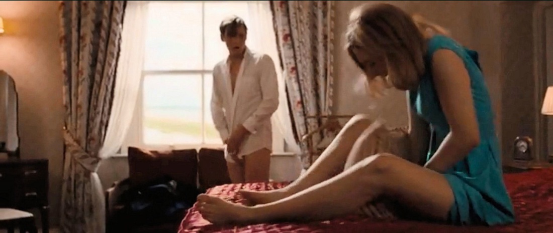 Blue eyed Riley Reyes tugs a hard big cock naked on the Bed